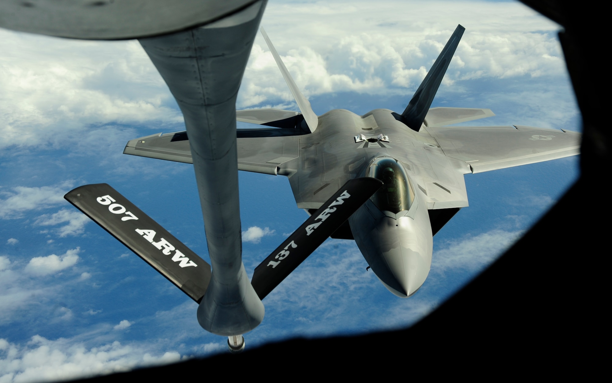 A U.S. Air Force F-22 Raptor assigned to the 90th Fighter Squadron, Elmendorf Air Force Base, Alaska, receives fuel from a KC-135 Stratotanker assigned to the 465 Air Refueling Squadron, Tinker AFB, Okla., near Guam, Feb. 17, 2010.
(U.S. Air Force photo by Staff Sgt. Andy M. Kin / Released)