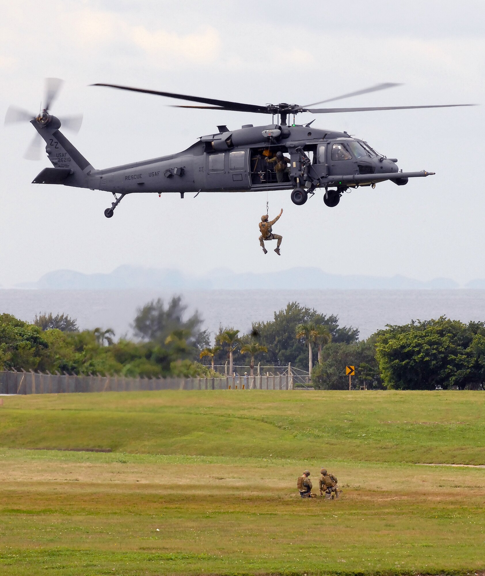 Pararescuemen from the 31st Rescue Squadron rappel from an HH-60 Pave Hawk during the unit's Rescue Fest Feb. 20. Airmen from the unit held several demonstrations on how they rappel into areas, how they recover victims from mountainous terrain, and how to survive when stuck behind enemy lines. (U.S. Air Force photo/Staff Sgt. Jason Lake)