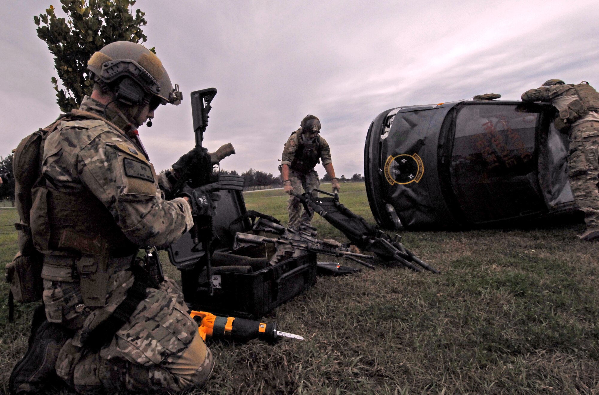 Pararescuemen from the 31st Rescue Squadron prepare to extract a simulated car wreck victim during the unit's Rescue Fest Feb. 20. Hundreds of servicemembers and their families visited the 31st RQS to watch rescue and survival demonstrations and talk with Airmen in the unit about how they contribute to the Air Force mission. (U.S. Air Force photo/Staff Sgt. Jason Lake)