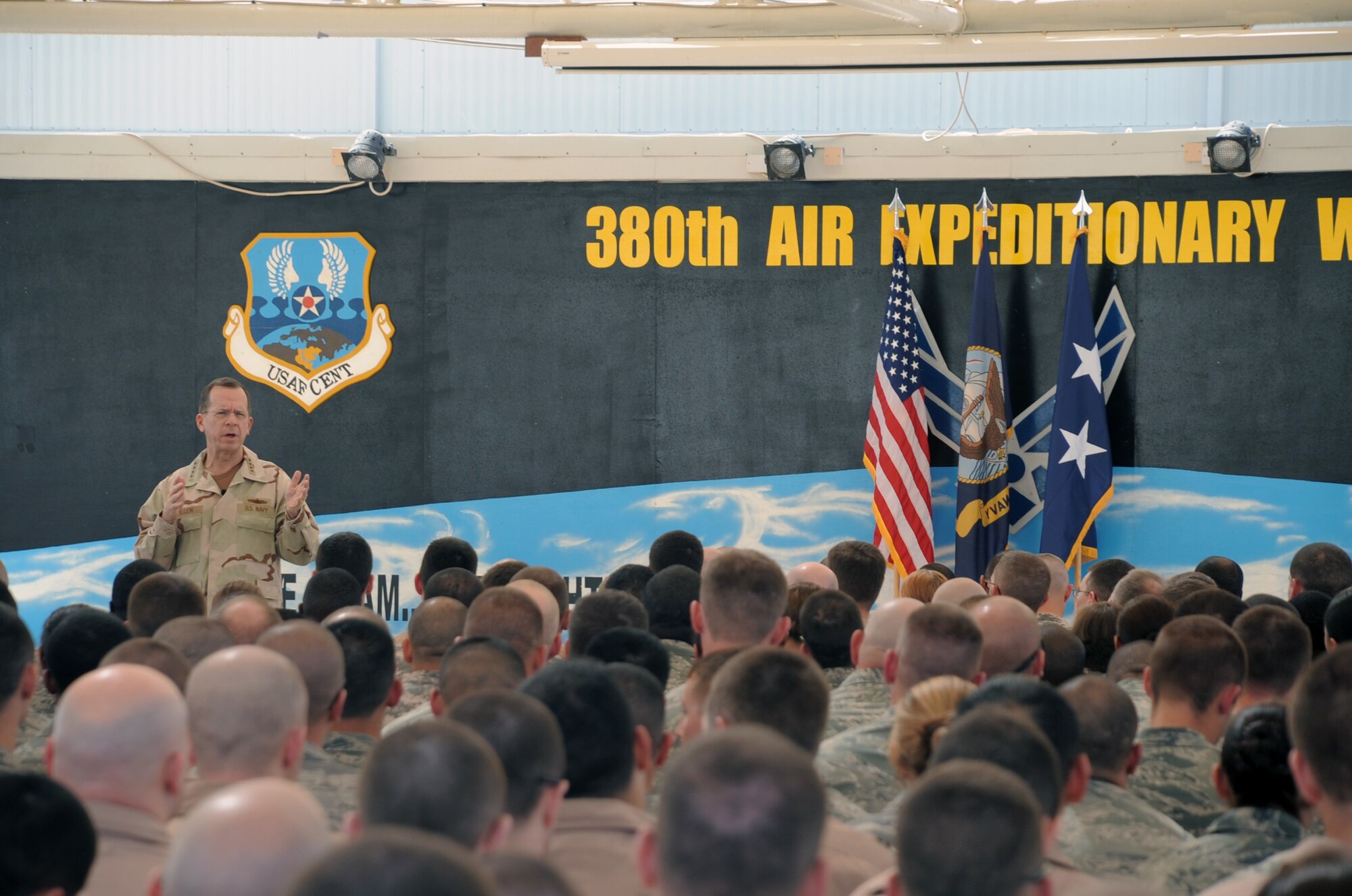 U.S. Navy Adm. Mike Mullen, Chairman of the Joint Chiefs of Staff, talks to service members during an "All Hands" call during a visit to the 380th Air Expeditionary Wing by Admiral Mullen on Feb. 18, 2010, to a non-disclosed base in Southwest Asia.  (U.S. Air Force Photo/Senior Airman Jenifer Calhoun/Released)