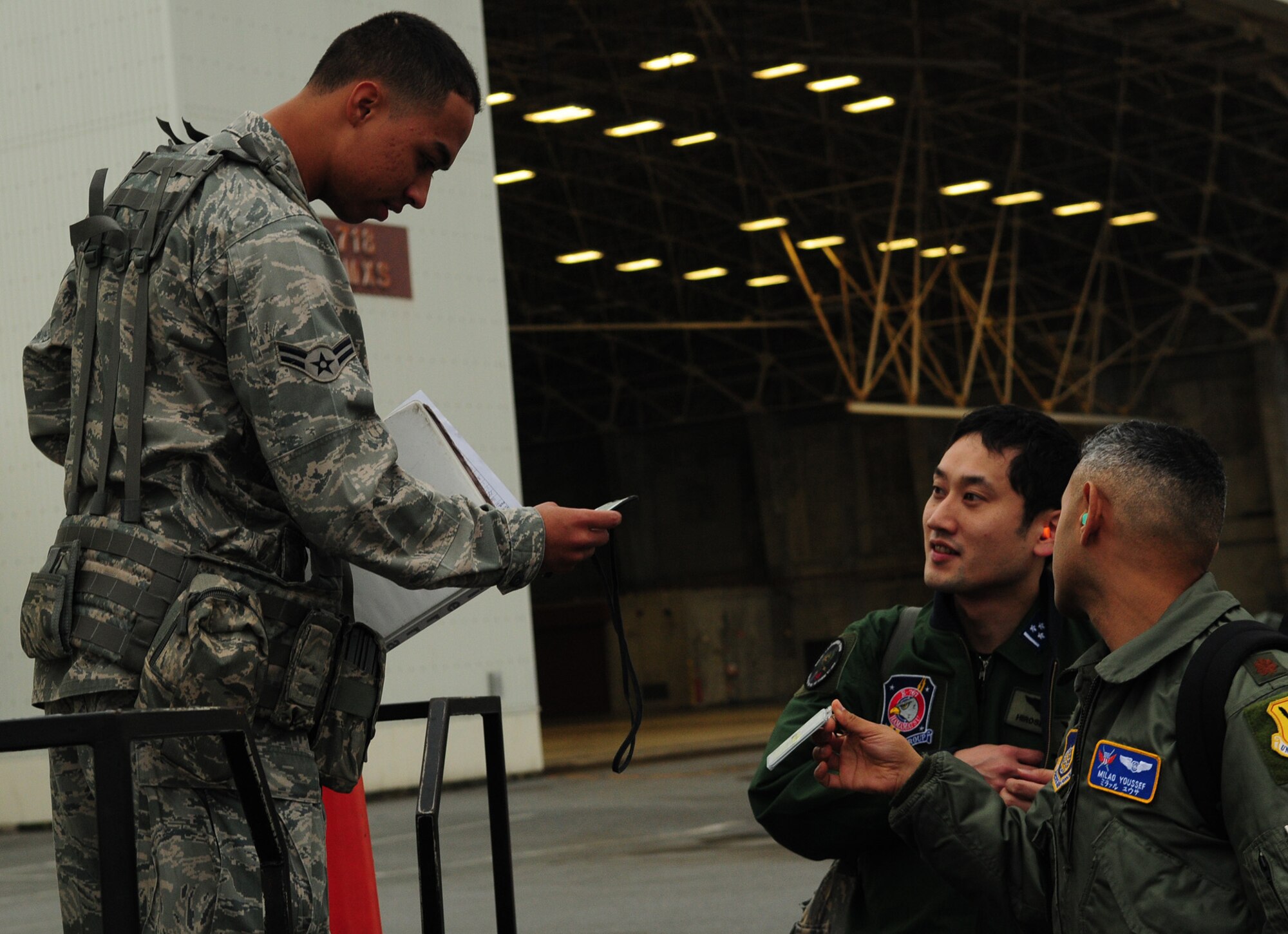 Capt. Daisuke Hirose, 602nd Airborne Air Control Squadron at Hamamatsu Air Base, Tokyo, served as the safety officer on board the E-3 during a mission in support of Exercise Cope North. (U.S. Air Force/Senior Airman Amanda Grabiec)