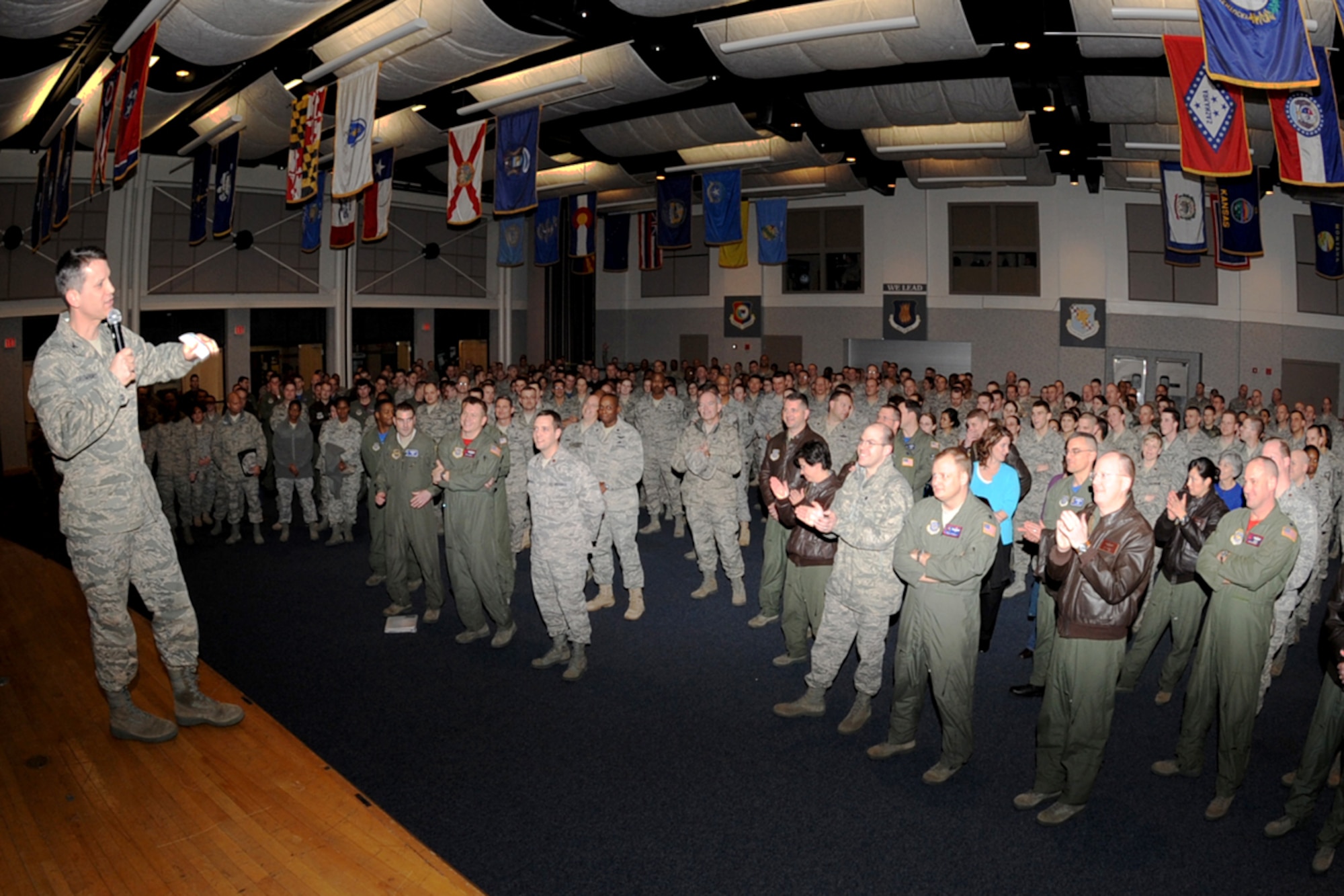 Col. James Crowhurst, 22nd Air Refueling Wing commander, speaks about keeping a positive attitude and staying motivated during a unit compliance inspection pep rally at the Robert J. Dole Center ballroom, Feb. 19, 2010, McConnell Air Force Base, Kan. During the UCI, inspectors from Air Mobility Command will evaluate McConnell’s work centers to ensure they are compliant with regulations. (U.S. Air Force Photo/Senior Airman Maria Ruiz)