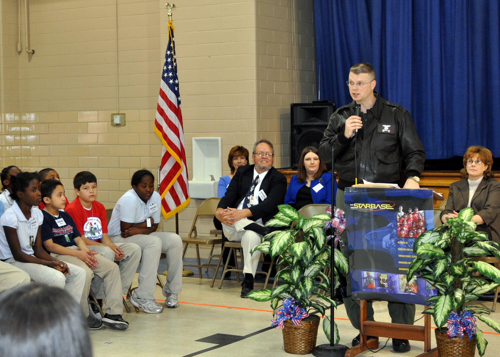 Capt. Jonathan Ard, an electronic warfare officer for the 11th Bomb Squadron, currently an instructor for the 93rd Bomb Squadron on Barksdale Air Force Base, La., speaks to a group of Starbase graduates at Meadowview Elementary School in Bossier City, La., on Feb. 8, 2010. Starbase, a Department of Defense funded program, sponsored by the 917th Wing on Barksdale, offers a 25-hour hands-on aerospace and aviation curriculum committed to addressing needs in Science, Technology, Engineering and Mathematics. (U.S. Air Force Photo/Senior Airman Crystal Marie Jordan)