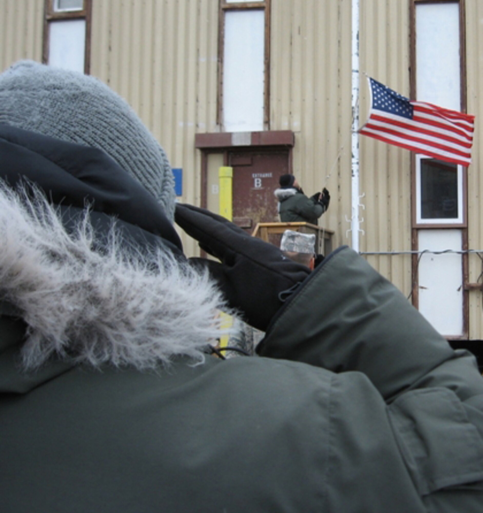As the 2009-2010 Operation Deep Freeze season winds down, Airmen at McMurdo Station, Antarctica, hold a retreat ceremony Feb. 16 2010, following the departure of the last LC-130 Hercules from the continent.  (Courtesy photo)