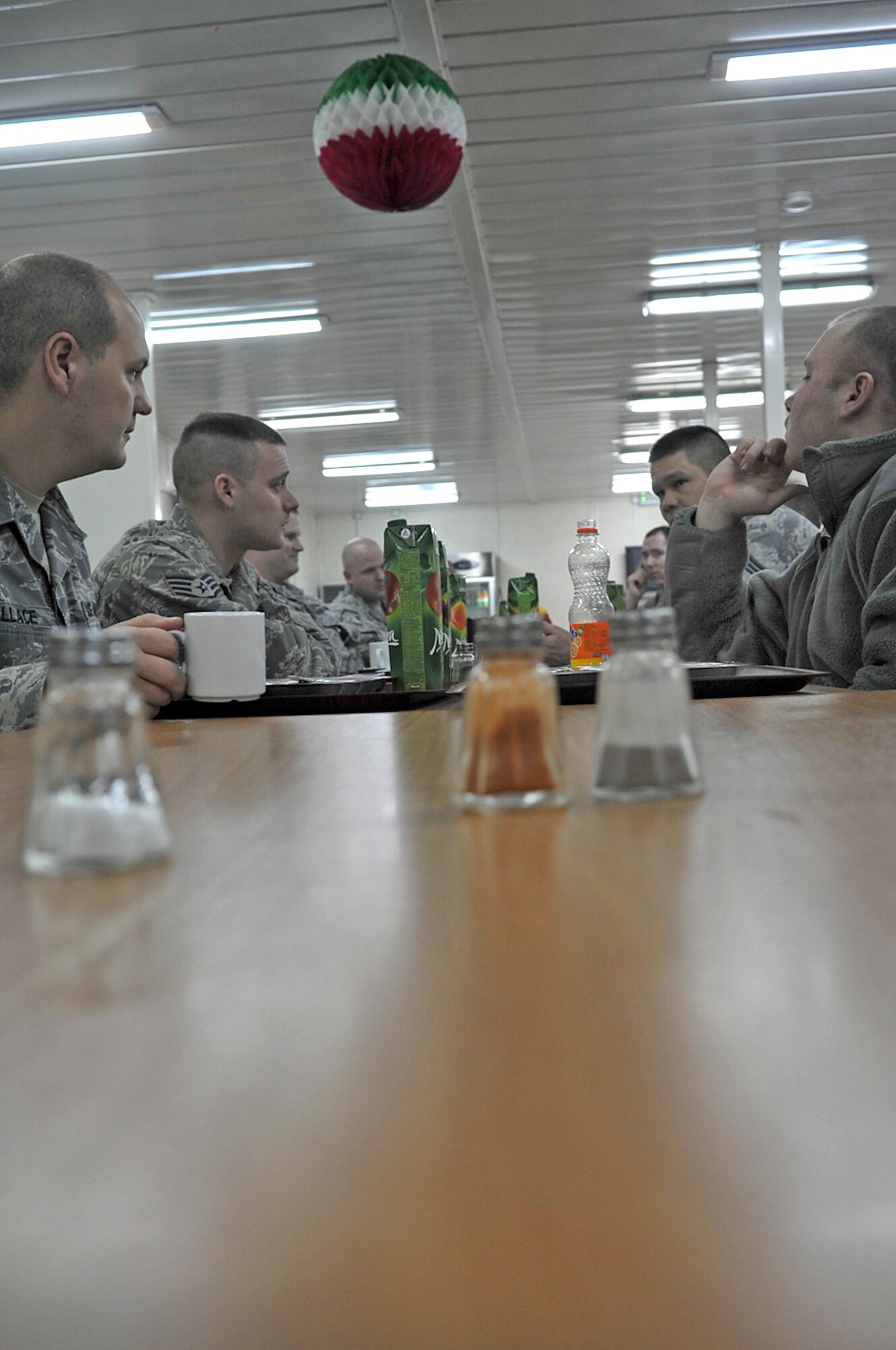 Airmen from the 1st Combat Communications Squadron at Ramstein Air Base sit down to breakfast at the start of their day Feb. 9, 2010, at the Krtsanisi National Training Center,Republic of Georgia. (U.S. Air Force photo/Senior Airman Tony R. Ritter)