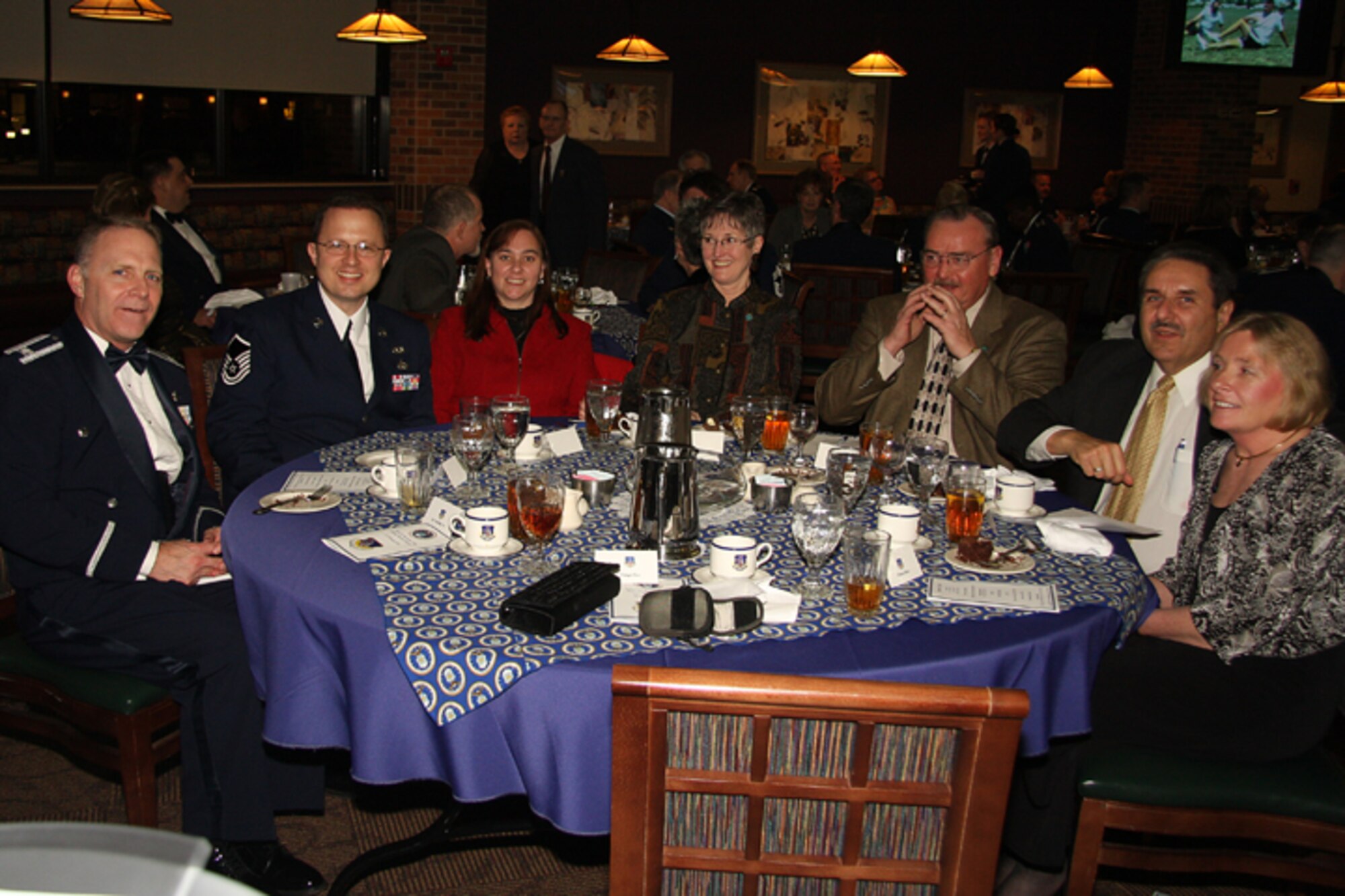 GRISSOM AIR RESERVE BASE, Ind., -- Master Sgt. Wes Marion (second from left) and his wife Cindy, share their table with Col. Tim Cox, 434th Air Refueling Wing vice commander, and members of the Grissom Community Council. (U.S. Air Force photo/Tech. Sgt. Mark Orders-Woepmner)