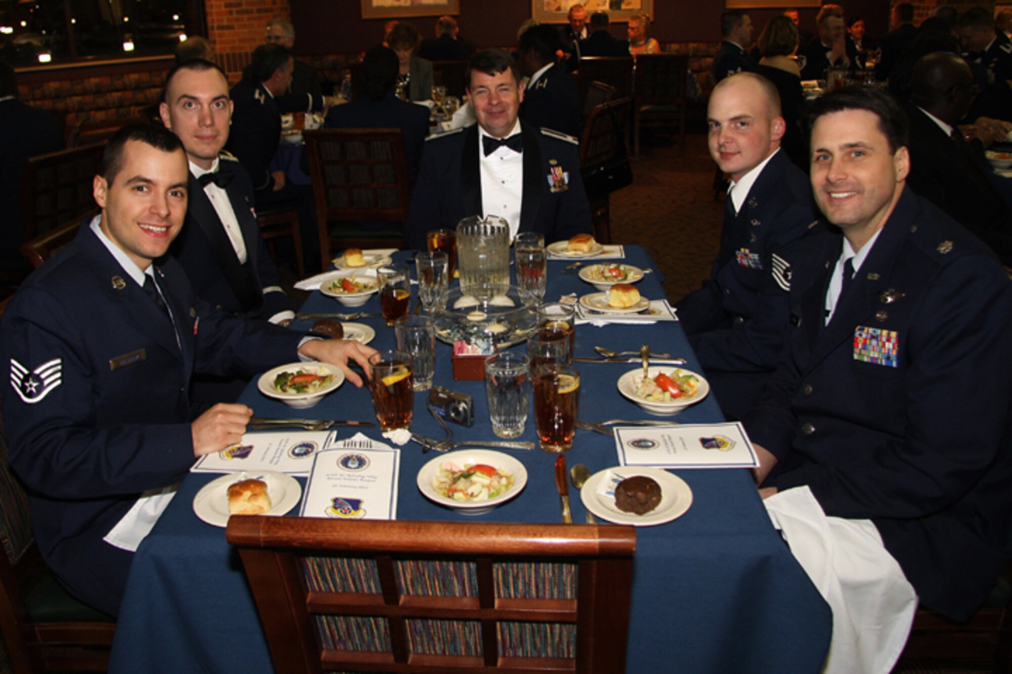 GRISSOM AIR RESERVE BASE, Ind., -- Members of the Grissom legal office are all smiles as they enjoy the festivities of the 2010 Annual Award Banquet (U.S. Air Force photo/Tech. Sgt. Mark Orders-Woepmner)