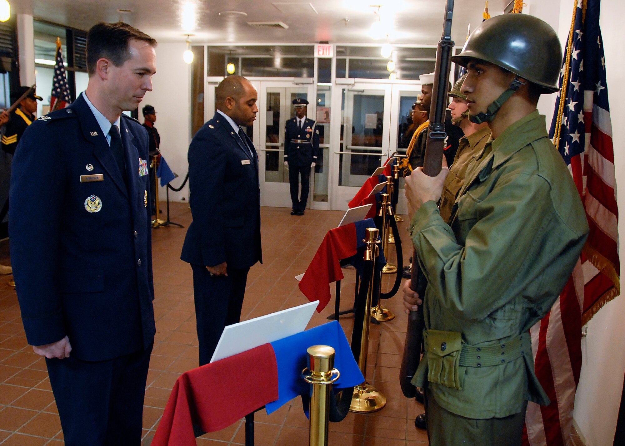 Col. Shawn Harrison, commander of the 82nd Training Group, inspects the Airmen in Training with Lt. Col. David Leazer, 89th Flying Training Squadron operations officer, during the Living Legends Banquet Museum at the Community Center Feb. 19. (U.S. Air Force photo/Mike Litteken)