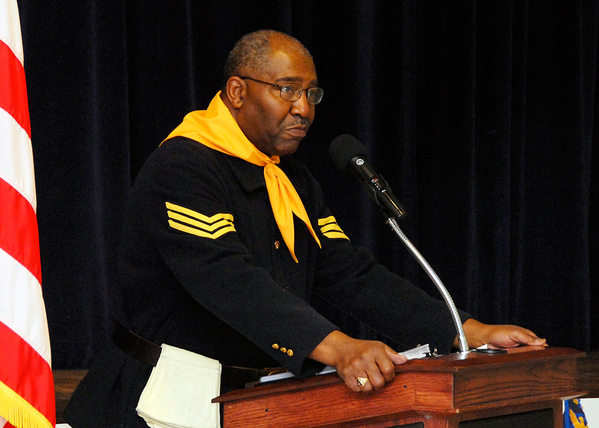 Trooper Fred Gray, former president of the Lawton-Fort Sill Chapter of the 9th and 10th Horse Cavalry Association of the Buffalo Soldiers, speaks at the Living Legends Banquet Museum at the Community Center Feb. 19. (U.S. Air Force photo/Mike Litteken)