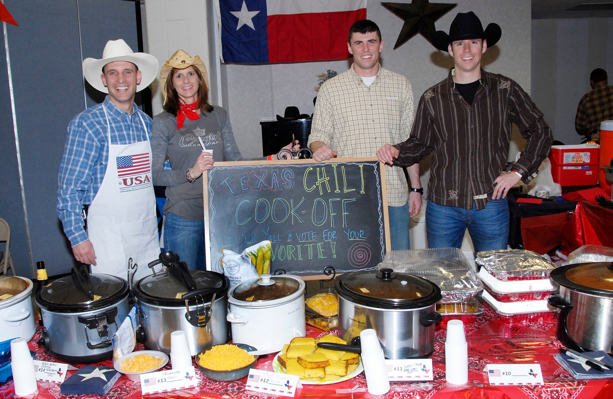 A Texas chili cook-off represents the United States at the Euro-NATO Joint Jet Pilot Training program's Around the World party at the Community Center Feb. 19. Members from the 80th Flying Training Wing represented their country with different foods. (U.S. Air Force photo/Harry Tonemah)