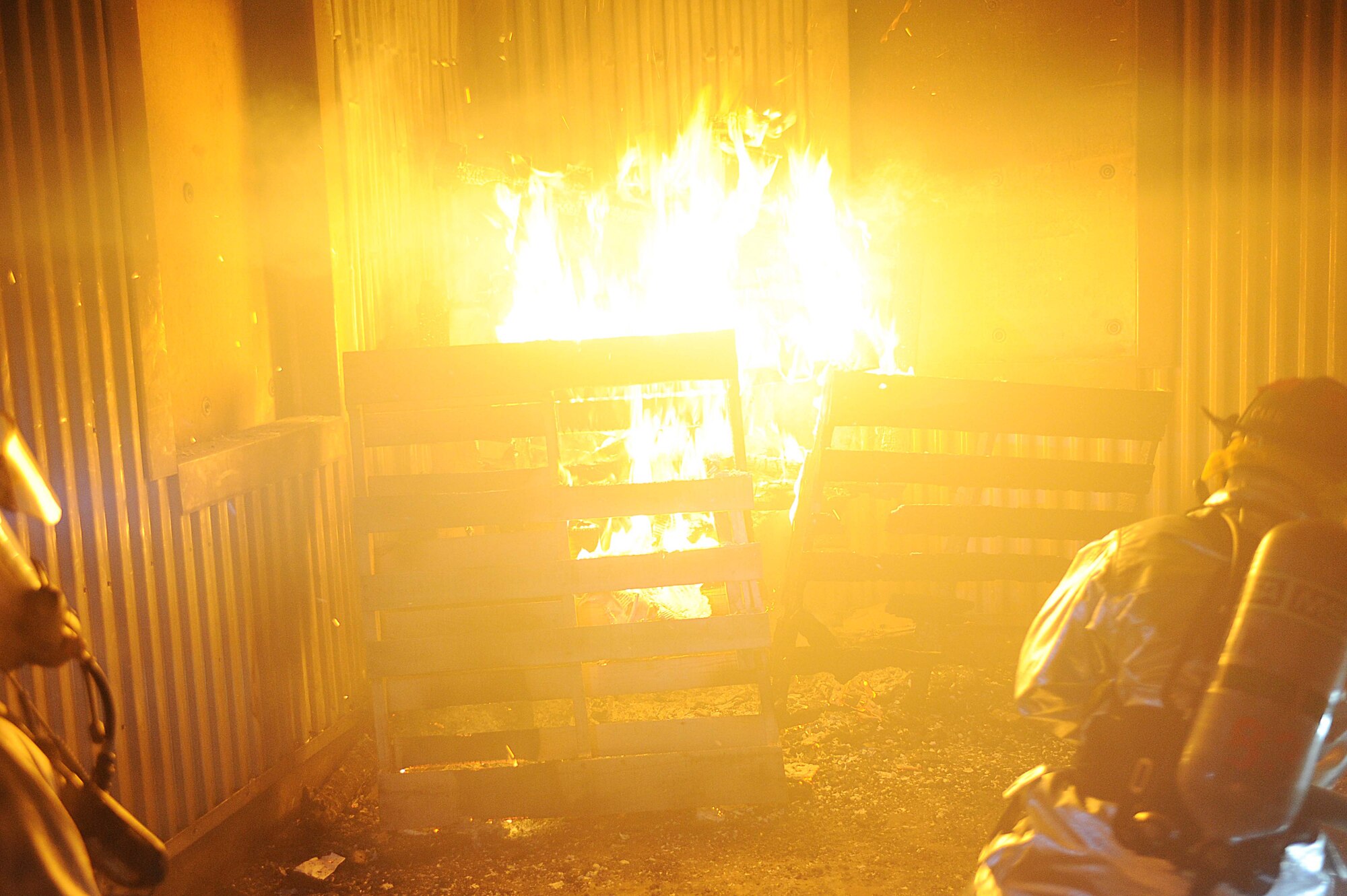 ELLSWORTH AIR FORCE BASE, S.D.-- 28th Civil Engineer Squadron firefighters conduct a night structural fire training exercise, Feb. 17. Ellsworth’s fire department trains every day to respond to emergencies. (US Air Force photo/Airman 1st Class Corey Hook)