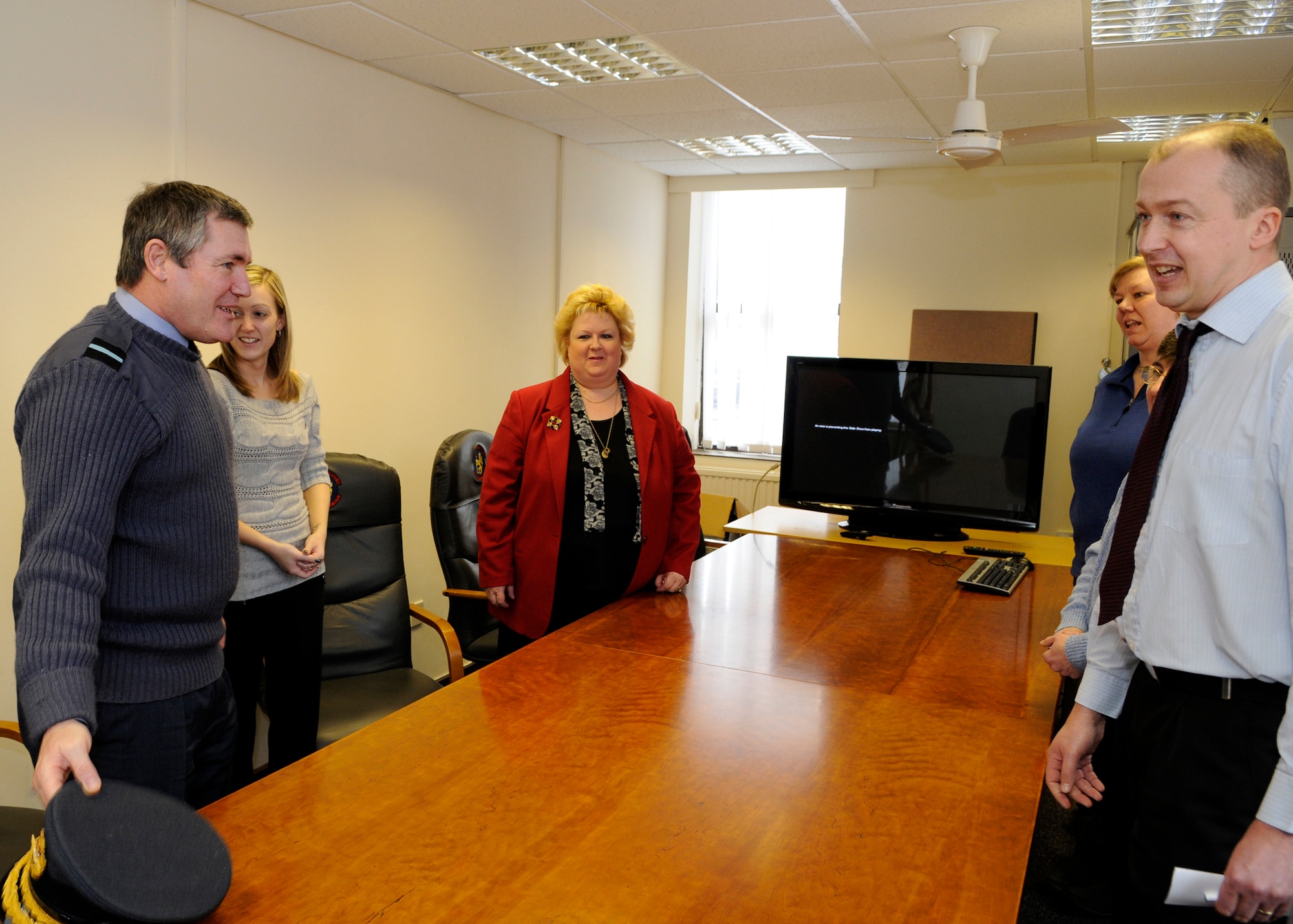 RAF MILDENHALL, England – Air Commodore Les O’Dea, Headquarters, Air Commanding Directly Administered Units, visits Ministry of Defence employees at the 100th Security Forces office Feb. 22.  The Air Commodore also visited several other MOD employees throughout the base.  (U.S. Air Force photo/Staff Sgt. Christopher L. Ingersoll)
