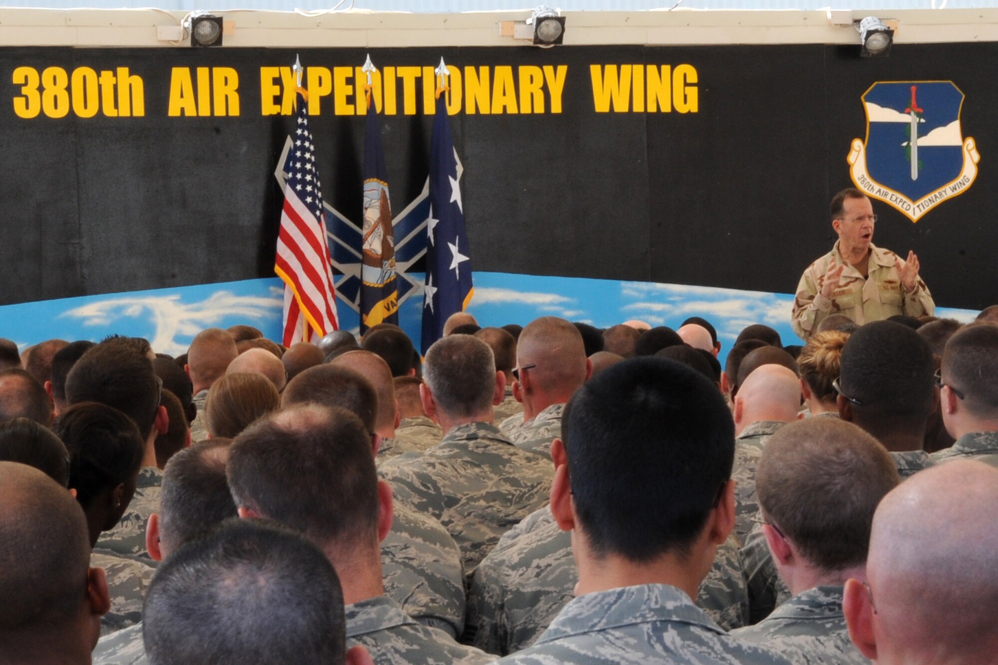 U.S. Navy Adm. Mike Mullen, Chairman of the Joint Chiefs of Staff, talks to service members during an "All Hands" call during a visit to the 380th Air Expeditionary Wing by Admiral Mullen on Feb. 18, 2010, to a non-disclosed base in Southwest Asia. (U.S. Air Force Photo/Senior Airman Jenifer H. Calhoun/Released)
