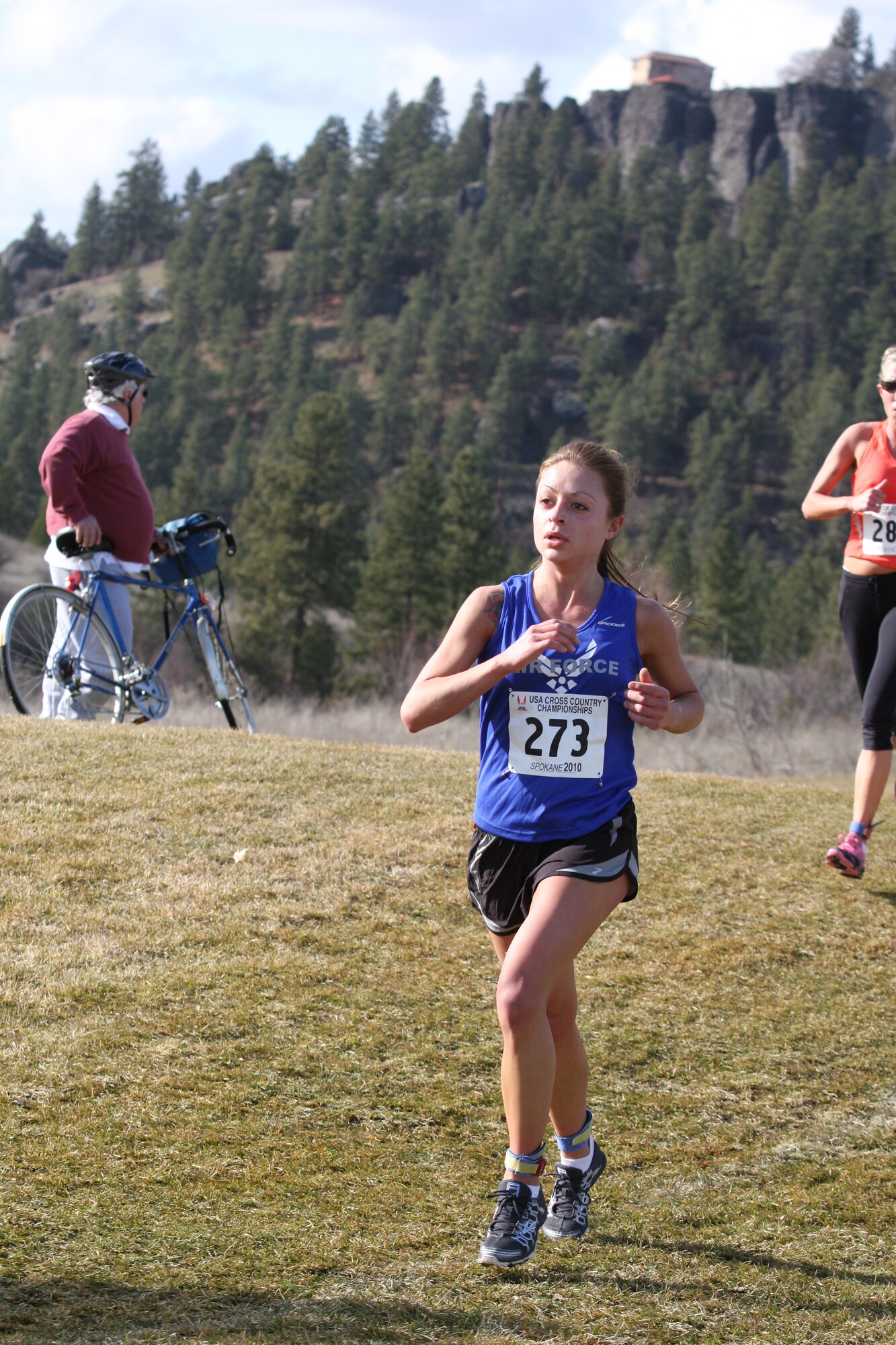 Senior Airman Angela Martell from the 21st Dental Squadron, Peterson Air Force Base, Colo., finished in eighth place with a time of 30:56, a pace of 6:13 minutes per mile.  (U.S. Air Force photo by Stephen Brown)
