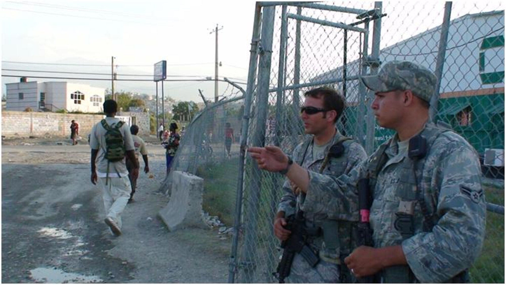 PORT-AU-PRINCE, Haiti -- Airmen from the 823rd Expeditionary Security Forces Squadron guard the main entrance to the Toussaint L'Ouverture International Airport here. (Courtesy photo)