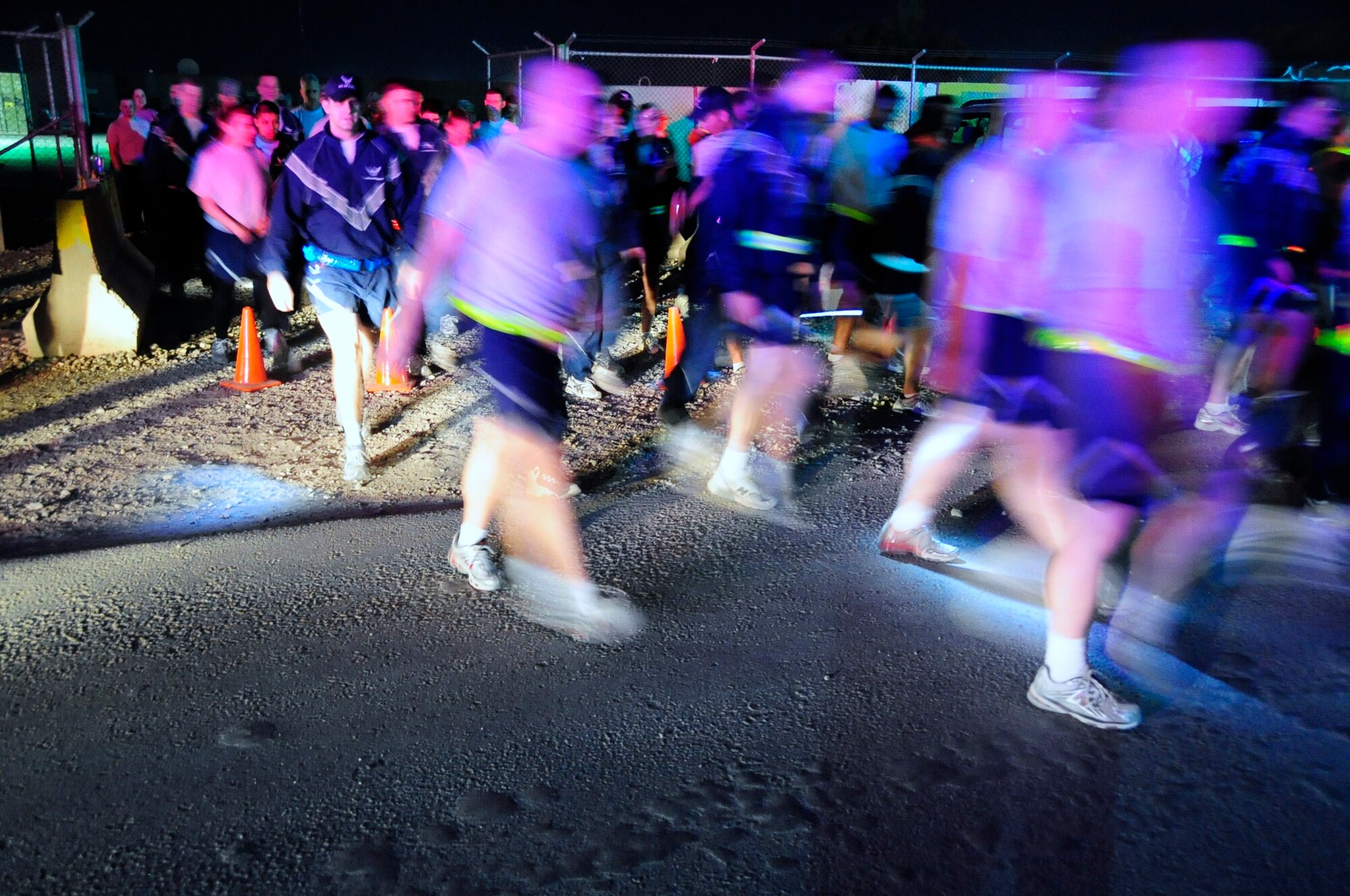 Members of the 407th Air Expeditionary Group joined hundreds of Soldiers and Sailors in the Sexual Assault Prevention and Response (SAPR) Walk at Ali Base, Iraq, Feb. 12, 2010. The 'We Own the Night' walk is intended to increase awareness of the SAPR program here and across the uniformed services. (U.S. Air Force photo by Master Sgt. Darrell Habisch/Released)