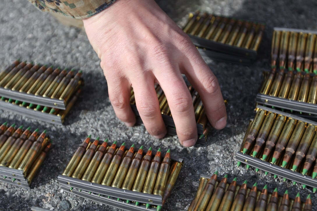 Cpl. Benjamin Smith, a storage team leader with the Center Magazine Area, inventories ammunition at the unit's magazine area Feb. 23.