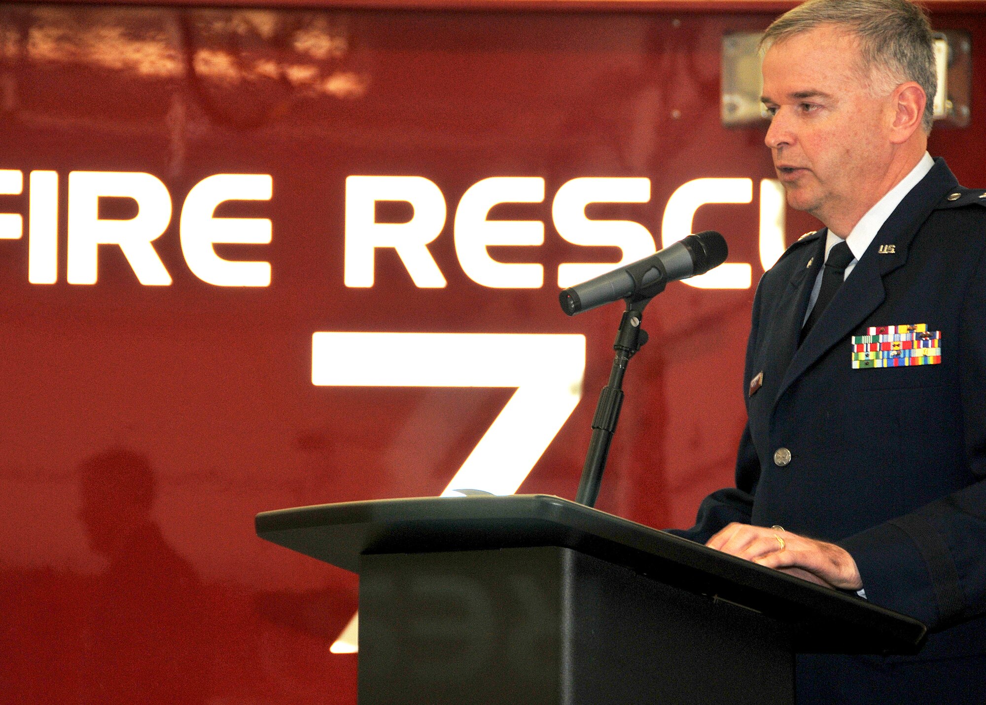 Wisconsin Air National Guard Commander Brig. Gen. John McCoy speaks at a dedication ceremony at the Truax Field Fire and Rescue Station Feb. 19. McCoy was joined by U.S. Senator for Wisconsin Herb Kohl to formally dedicate the new station, which serves the Dane County Regional Airport and surrounding communities, following a 12-month, $6 million renovation project. Wisconsin Air National Guard photo by Tech. Sgt. Jon LaDue 
