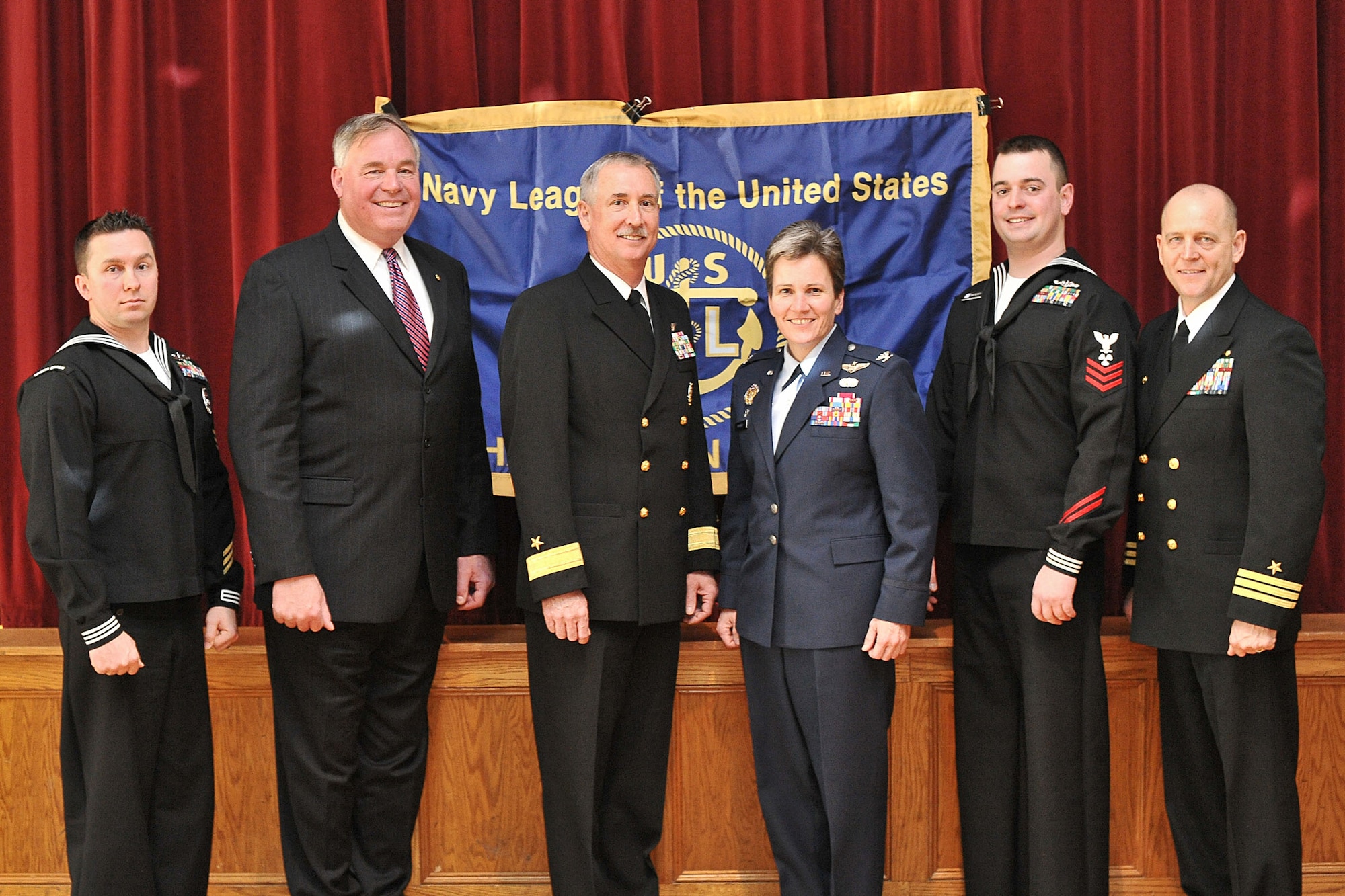 The Navy League Charleston chapter held a Sailor of the Year luncheon at the Redbank Club on board Naval Weapons Station Charleston to honor the Sailors of the Year within the installation Feb. 19.
For their outstanding achievements, Master-at-Arms 1st Class (SW) Jacob Moore, Naval Weapons Station Charleston, Machinist's Mate 1st Class (SS) David Medert, Naval Nuclear Power Training Command and Machinist's Mate 1st Class (SS) Thomas Coulter, Nuclear Power Training Unit (not pictured) received commemorative plaques and gifts.
From left to right, Master-at-Arms 1st Class (SW) Jacob  Moore, Naval Weapons Station Charleston; Robert E. Besal, Rear Admiral, U.S. Navy (ret.), president of the Navy League Charleston chapter, Rear Admiral Townsend Alexander, commander, Navy Region Southeast (CNRSE), Colonel Martha Meeker, 628th Air Base Wing commander, Joint Base Charleston, Machinist's Mate 1st Class (SS) David Medert, Naval Nuclear Power Training Command and Commander Gary D. Martin, commanding officer, Naval Weapons Station Charleston, attended the event. (U.S. Navy photo/Mass Communicator 3rd Class Juan Pinalez)

