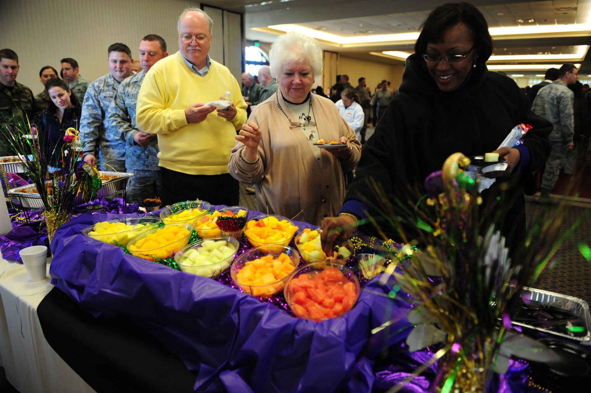 Attendees line up for free samples during the Second Annual Force Support Squadron Food Show at the Charleston Club here Feb. 18. Individuals at the show tasted and voted on their favorite foods to be considered for addition to menus at various restaurants around base. (U.S. Air Force photo/Staff Sgt. Ali Flisek)
