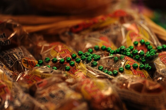 Mardi Gras beads lay across packaged doughnuts at the Second Annual Force Support Squadron Food Show here Feb. 18. (U.S. Air Force photo/Senior Airman Daniel Owen)