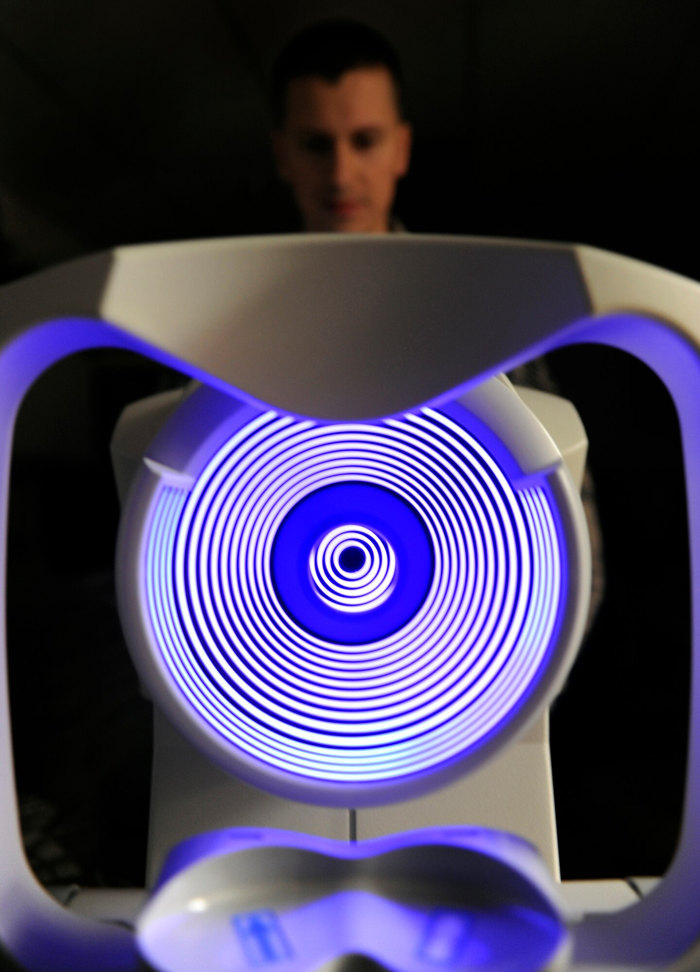 Tech. Sgt.  James Gonzales reads a corneal topographer Feb. 17, 2010, Eielson Air Force Base, Alaska. The corneal topographer maps the eye cornea for corneal disorders and can evaluate individuals for refractive surgery qualifications. Sergeant Gonzales is a 354th Medical Group optometry technician. (U.S. Air Force photo/Airman 1st Class Willard E. Grande II)