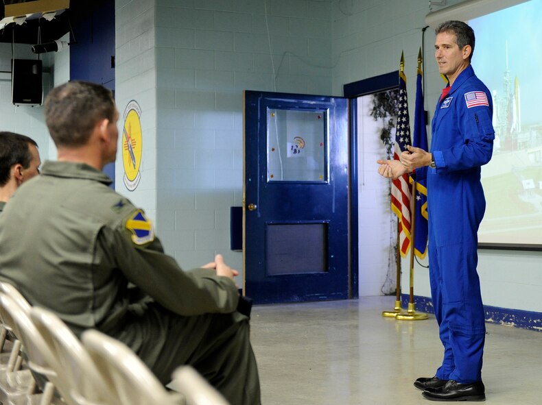 HOLLOMAN AIR FORCE BASE, N.M. -- Retired Col. Michael Good, NASA Astronaut and crew member of the Space Shuttle Atlantis STS-125, speaks to members of the 746th Test Squadron and thanks them for their support. STS-125 was the fifth and final Hubble servicing mission. The 746th TS played a key role in the mission to Hubble Space Telescope by servicing some equipment that was used on the mission. (U.S. Air Force photo by Airman 1st Class Eileen Payne)