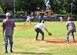 Players from both Soto Cano Air Base, Honduras and Utila stand poised to make a play as the pitcher throws the ball to the waiting batter Feb. 13 at the baseball field on Utila. The Soto Cano AB baseball team played against two Utila baseball teams Feb.13 and 14 to kick off Utila’s baseball season. (U.S. Air Force Photo/Staff Sgt. Bryan Franks) 