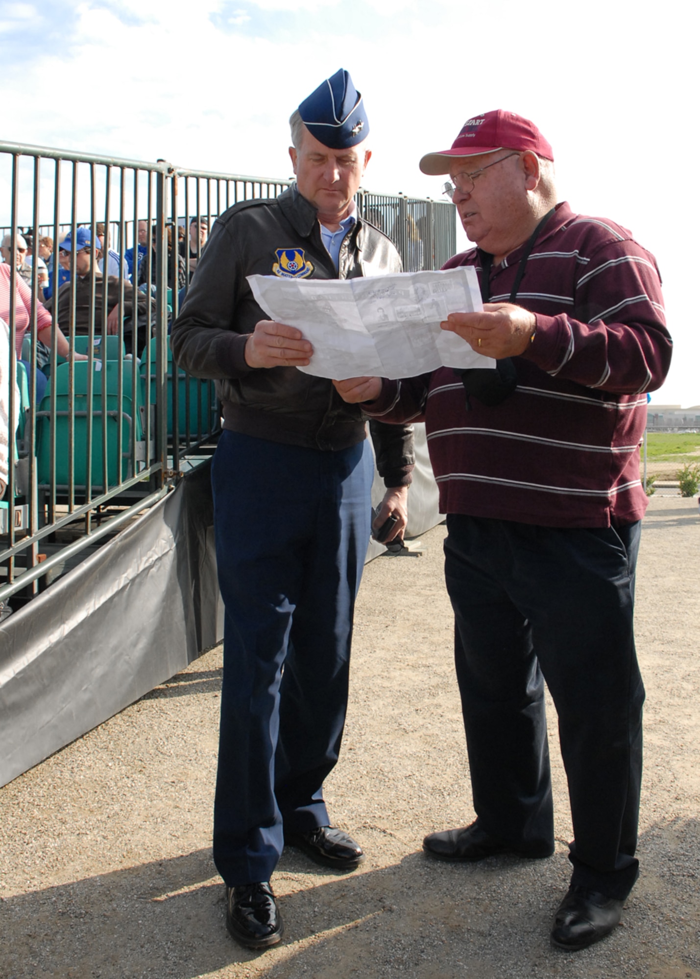 Maj. Gen. David Eichhorn, Air Force Flight Test Center commander, talks with a veteran at the California State University at Bakersfield's season-opening game against Air Force Academy Feb. 19. As part of the opening ceremony, the general threw out the ceremonial first pitch. (Air Force photo/Airman 1st Class William O'Brien) 