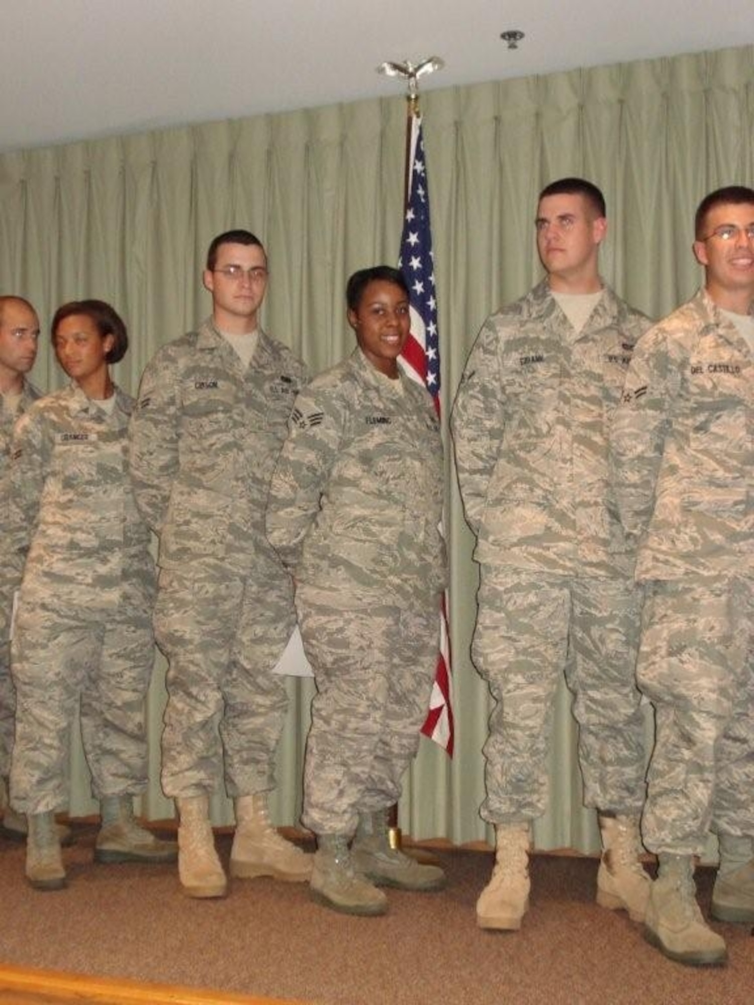 Senior Airman Lindsey Fleming (center), a reservist assigned to the 315th Operations Support Squadron, recently returned from a deployment and is currently working on Haiti relief efforts.  (Courtesy Photo)