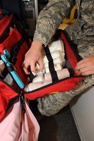 WHITEMAN AIR FORCE BASE, Mo. - Senior Airman Melissa Lerch, 509th Medical Operations Squadron aerospace medical technician, inventories medical supplies aboard the ambulance Feb. 23, 2010. Ambulance Services are on-call 24 hours a day, ready to respond to anything from an emergency landing on the airfield, to a sprained ankle at the fitness center.  (U.S. Air Force photo/ Airman 1st Class Carlin Leslie)

