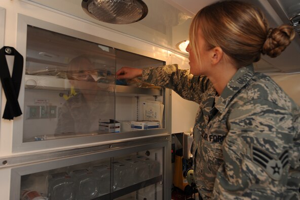 WHITEMAN AIR FORCE BASE, Mo. - Senior Airman Melissa Lerch, 509th Medical Operations Squadron aerospace medical technician, inventories medical supplies aboard the ambulance Feb. 23, 2010. Ambulance Services are on-call 24 hours a day, ready to respond to anything from an emergency landing on the airfield, to a sprained ankle at the fitness center. (U.S. Air Force photo/ Airman 1st Class Carlin Leslie)

