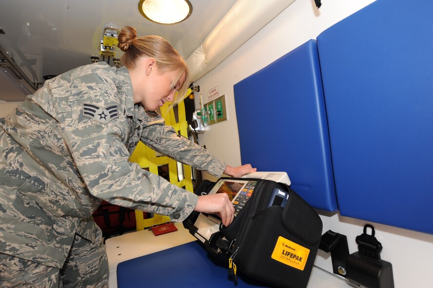 WHITEMAN AIR FORCE BASE, Mo. - Senior Airman Melissa Lerch, 509th Medical Operations Squadron aerospace medical technician, inspects the LIFEPAX, which is used to monitor vitals of a patient in need, Feb. 23, 2010. Ambulance Services are on-call 24 hours a day, ready to respond to anything from an emergency landing on the airfield, to a sprained ankle at the fitness center. (U.S. Air Force photo/ Airman 1st Class Carlin Leslie)


