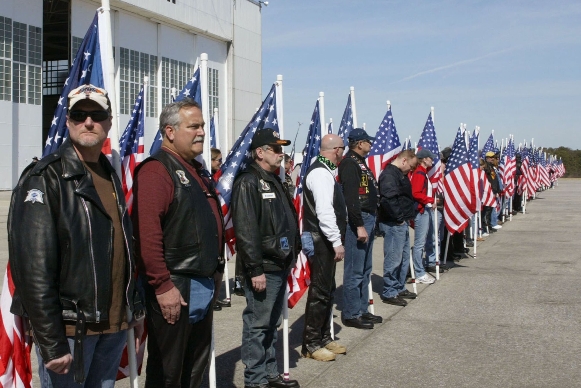 Members of the Patriot Guard honor Pfc. Jason H. Estopinal, a fallen Marine returning home during a dignified here Feb. 20. Estopinal was killed Monday while supporting Operation Enduring Freedom during combat operations in the Helmand province of Afghanistan. He was assigned to the 2nd Battalion, 2nd Marine Regiment, 2nd Marine Division, II Marine Expeditionary Force, Camp Lejeune, N.C. (U.S. Air Force photo/Don Peek)