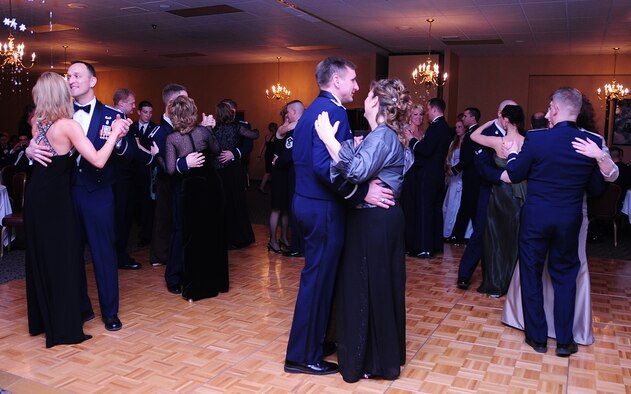 Airmen of the 28th Bomb Wing dance with their guests during the 28th Bomb Wing Winter Formal, Feb. 20. The U.S. Air Force Heartland of America Band "Night Wing" performed music during the event. (U.S. Air Force photo/Airman 1st Class Anthony Sanchelli)