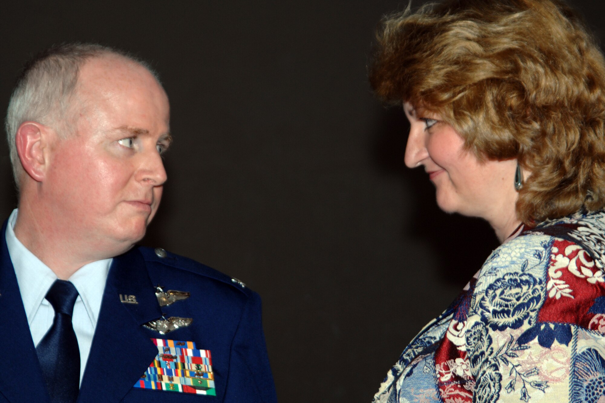 GRISSOM AIR RESERVE BASE, Ind. , -- Col. Thom Pemberton,  434th Operations Group deputy commander, shares a special glance with his wife Dawn, after she pins on his new shoulder insignia during a recent promotion ceremony.  (U.S. Air Force photo/Tech. Sgt. Doug Hays)