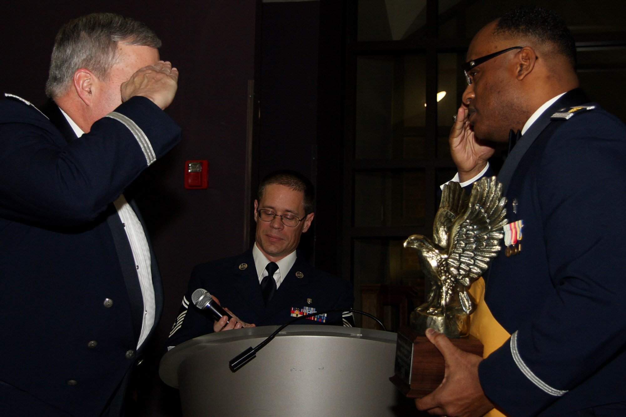 GRISSOM AIR RESERVE BASE, Ind. , -- Brig. Gen. Dean Despinoy, 434th Air Refueling Wing commander, left, returns the salute from Chaplain (Maj.) Obadiah Smith, 434th ARW chaplain, after presenting him a trophy for being the Officer of the  Year. (U.S. Air Force photo/Tech. Sgt. Mark Orders-Woempner)