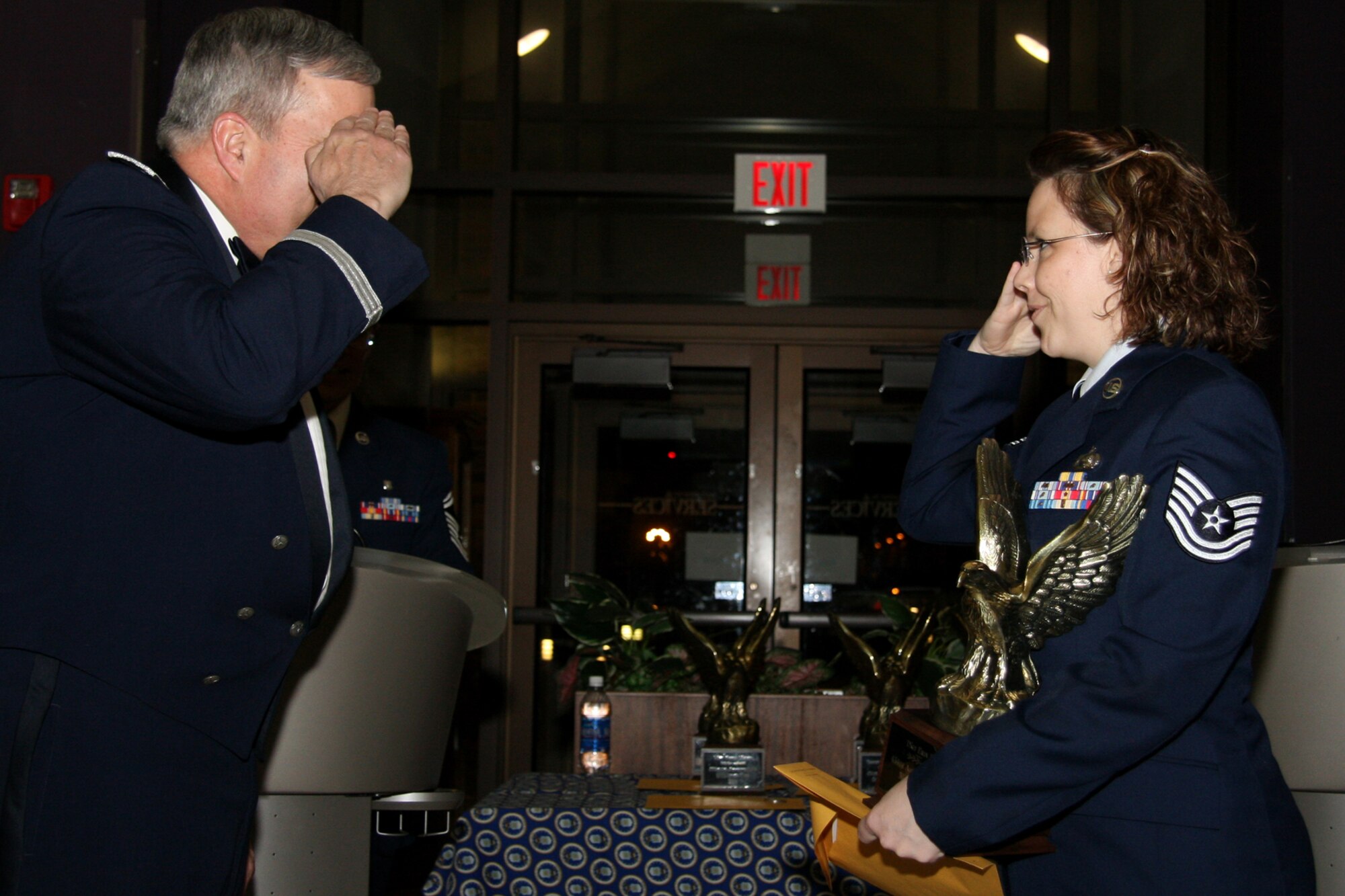 GRISSOM AIR RESERVE BASE, Ind. , -- Tech. Sgt. Erin Baker, 434th Logistics Readiness Squadron logistics plans technician, receives a trophy recognizing her selection as Grissom?s NCO of the Year, from Brig. Gen. Dean Despinoy, 434th Air Refueling Wing commander.  (U.S. Air Force photo/Tech. Sgt. Mark Orders-Woempner)