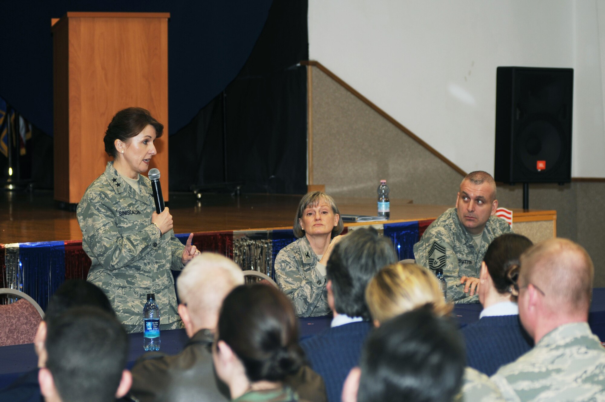 Maj. Gen. Kimberly Siniscalchi, Assistant Air Force Surgeon General, Medical Force Development, addresses the staff of the 31st Medical Group Feb 22, at the Aviano community center. During this time, General Siniscalchi addressed concerns and answered questions the Airmen had about future medical policies and procedures. (U.S. Air Force photo/Airman LaVel Sterling)