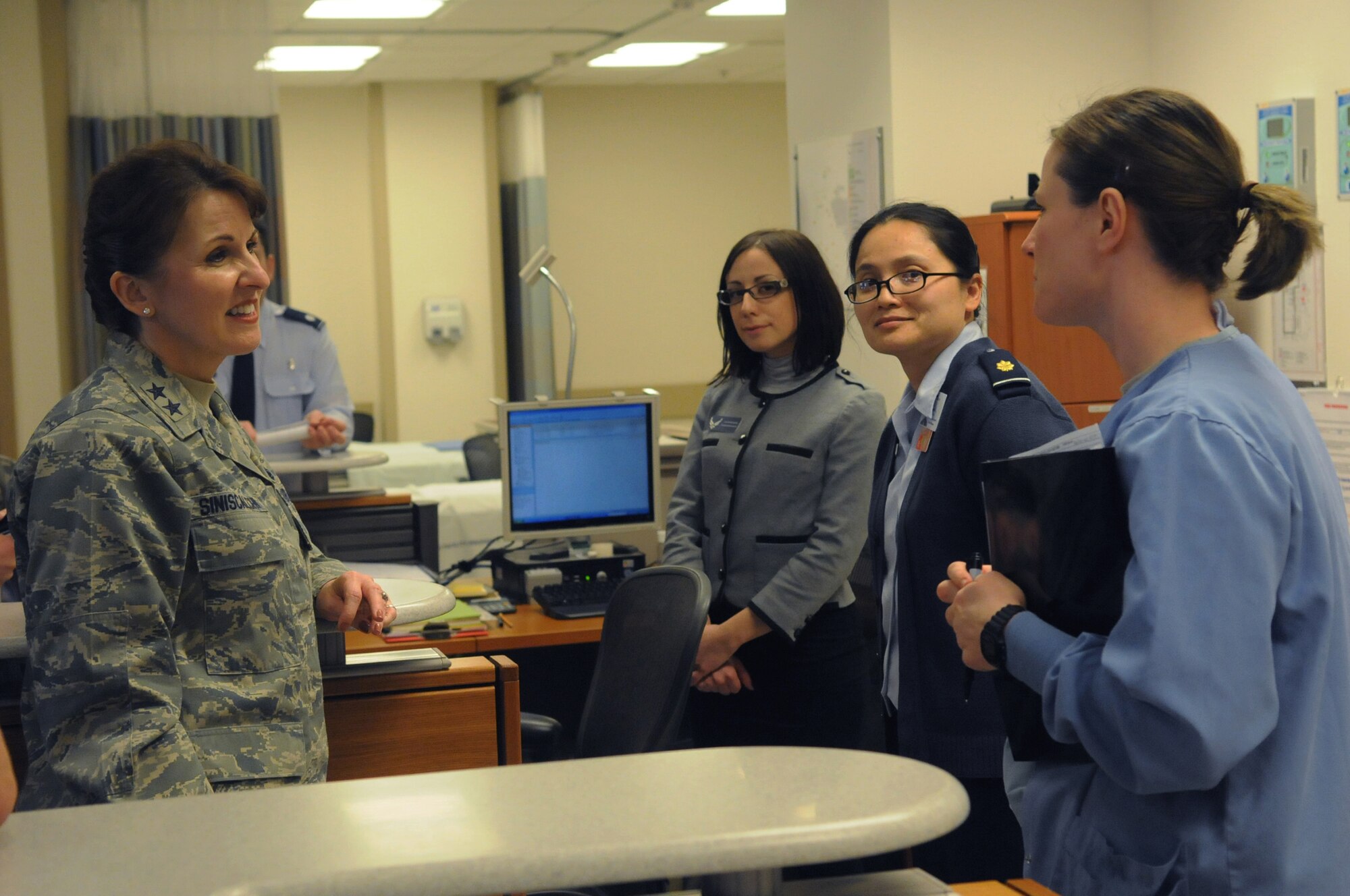 Maj. Gen. Kimberly Siniscalchi, Assistant Air Force Surgeon General, visits with the staff of the 31st Medical Group at the Aviano base hospital Feb. 22. General Siniscalchi was given a tour of the facilities and an opportunity to meet with Airmen during her visit.(U.S. Air Force photo/Airman LaVel Sterling)