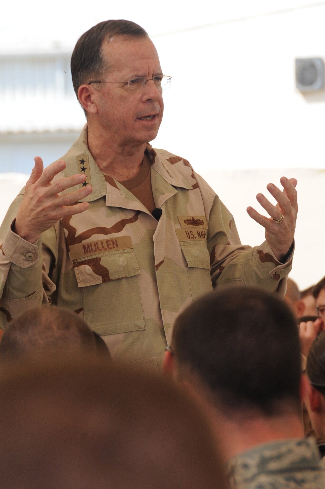U.S. Navy Adm. Mike Mullen, Chairman of the Joint Chiefs of Staff, talks to service members during an "All Hands" call during a visit to the 380th Air Expeditionary Wing by Admiral Mullen on Feb. 18, 2010, to a non-disclosed base in Southwest Asia. (U.S. Air Force Photo/Senior Airman Jenifer H. Calhoun/Released)
