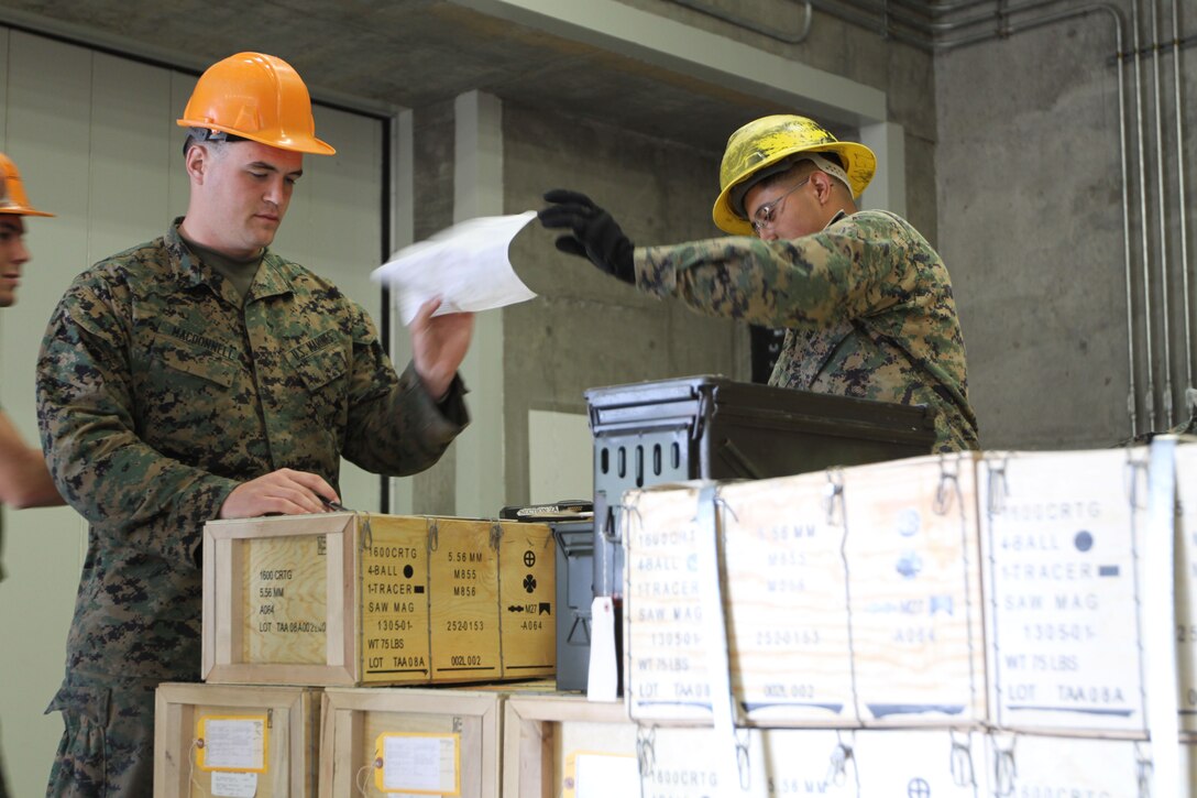 Staff Sgt. Cyle Burton, senior drill instructor, Platoon 1066, Co. D, corrects Pfc. Nicholas Temple, Platoon 1066, Co. D, on the Marine Corps Recruit Depot San Diego, Shepherd Memorial Drill Field, Feb 23. The Battalion Commander's Inspection is the final assessment a recruit will go through before graduating boot camp. The inspection can last up to three hours and can be very strenuous on the Marines as they wait under the San Diego sun. The next time the recruits step foot on the parade deck they will be leaving as America's newest United States Marines.