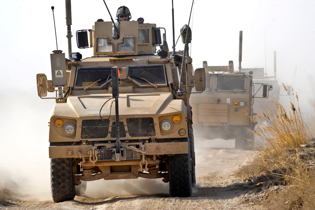 A U.S. Army mine-resistant, ambush-protected vehicle leads a convoy on a resupply mission during Operation Helmand Spider in Badula Qulp in Helmand province, Afghanistan, Feb. 15, 2010.