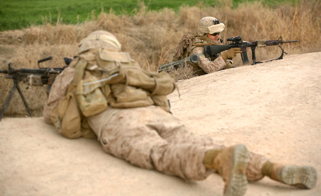 U.S. Marine Corps Lance Cpls. Ryan Hogan, left, and David Snipes ...