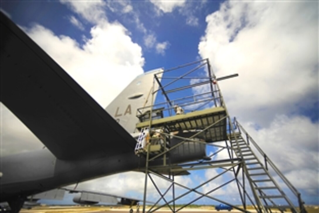 A U.S. Air Force maintenance crew checks a B-52 Stratofortress aircraft  after a mission to support exercise Cope North on Andersen Air Force Base, Guam, Feb. 15, 2010. The U.S. Air Force and the Japan Air Self-Defense Force conduct Cope North annually at Andersen to increase combat readiness and interoperability. The aircraft is assigned to the 20th Expeditionary Bomb Squadron on Barksdale Air Force Base, La.