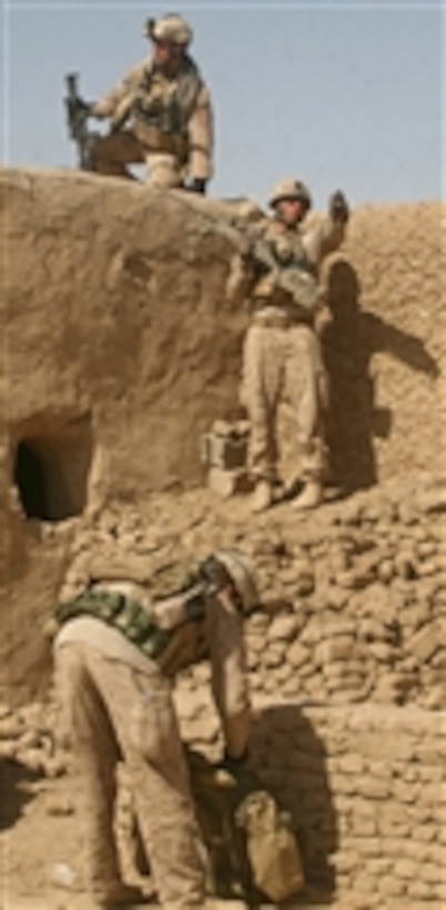 U.S. Marines with 3rd Platoon, India Company, 3rd Battalion, 6th Marine Regiment set up security inside a compound in Marjah, Helmand province, Afghanistan, on Feb. 16, 2010.  The Marines took shelter inside the compound after clearing it of insurgents and improvised explosive devices.  Marines and Afghan National Army soldiers have been conducting Operation Moshtarak to remove the Taliban from the town.  