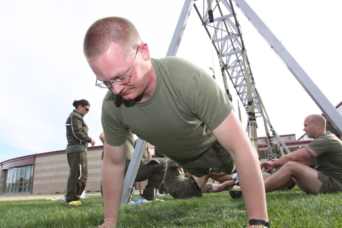Staff Sgt. Carl Wilderom, assistant retail manager, Combat Logistics Regiment 17, Camp Pendleton, utilizes a new suspension training system during a multi-day predeployment training tentatively called “MCCS Marine Training.” The unit is preparing to deploy to Afghanistan and is training to be Marine Corps Community Services representatives that would organize morale, welfare and recreational programs such as fitness and recreation centers, retail facilities and special sporting events.