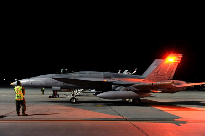 NELLIS AIR FORCE BASE, Nev. -- A F-18 assigned to the 77th Fighter Squadron, Royal Australian Air Force prepares to taxi out for a training mission at Red Flag 10-3 Feb. 23, 2010.  Red Flag is a realistic combat training exercise involving the air forces of the United States and its allies. The exercise is conducted on the 15,000-square-mile Nevada Test and Training Range, north of Las Vegas. (U.S. Air Force photo by Airman 1st Class Brett Clashman/RELEASED)
