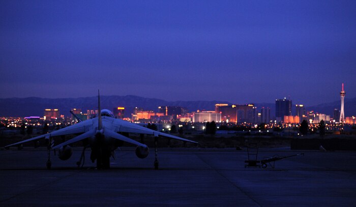 NELLIS AIR FORCE BASE, Nev. -- A GR-9 Harrier from RAF Cottesmore, U.K. sits on the flightline with the Las Vegas Strip in the background at Red Flag 10-3 Feb. 23, 2010.  Red Flag is a realistic combat training exercise involving the air forces of the United States and its allies. The exercise is conducted on the 15,000-square-mile Nevada Test and Training Range, north of Las Vegas. (U.S. Air Force photo by Airman 1st Class Brett Clashman/RELEASED)