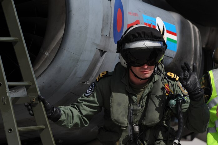 NELLIS AIR FORCE BASE, Nev. -- Flight Officer Deavin, 1st Fighter Squadron, pilot from RAF Cottesmore, U.K. gives the 'okay' sign before a training mission at Red Flag 10-3 Feb. 23, 2010.  Red Flag is a realistic combat training exercise involving the air forces of the United States and its allies. The exercise is conducted on the 15,000-square-mile Nevada Test and Training Range, north of Las Vegas. (U.S. Air Force photo by Airman 1st Class Brett Clashman/RELEASED)